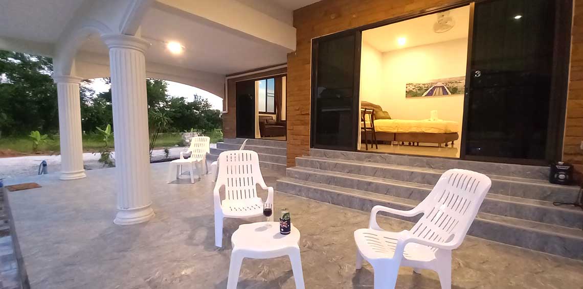 Enjoy a drink on your veranda by the pool